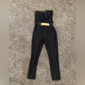 Lace Bebe size 10 jump suit with gold belt